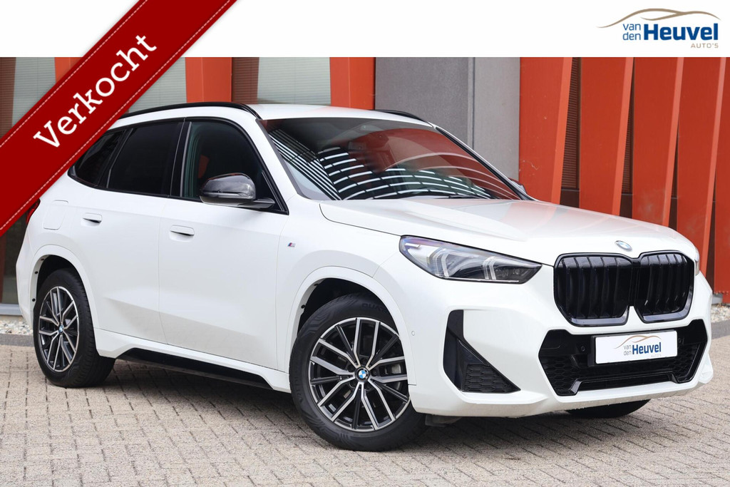 BMW X1 sDrive18i | M-Sport | Stoelverwarming | Trekhaak | Parkeercamera | Dodehoek | Lm Velgen | Mem. Stoel | 55689800-0.jpg | Van den Heuvel Auto's B.V.